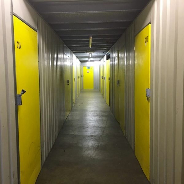 A hallway of self storage containers